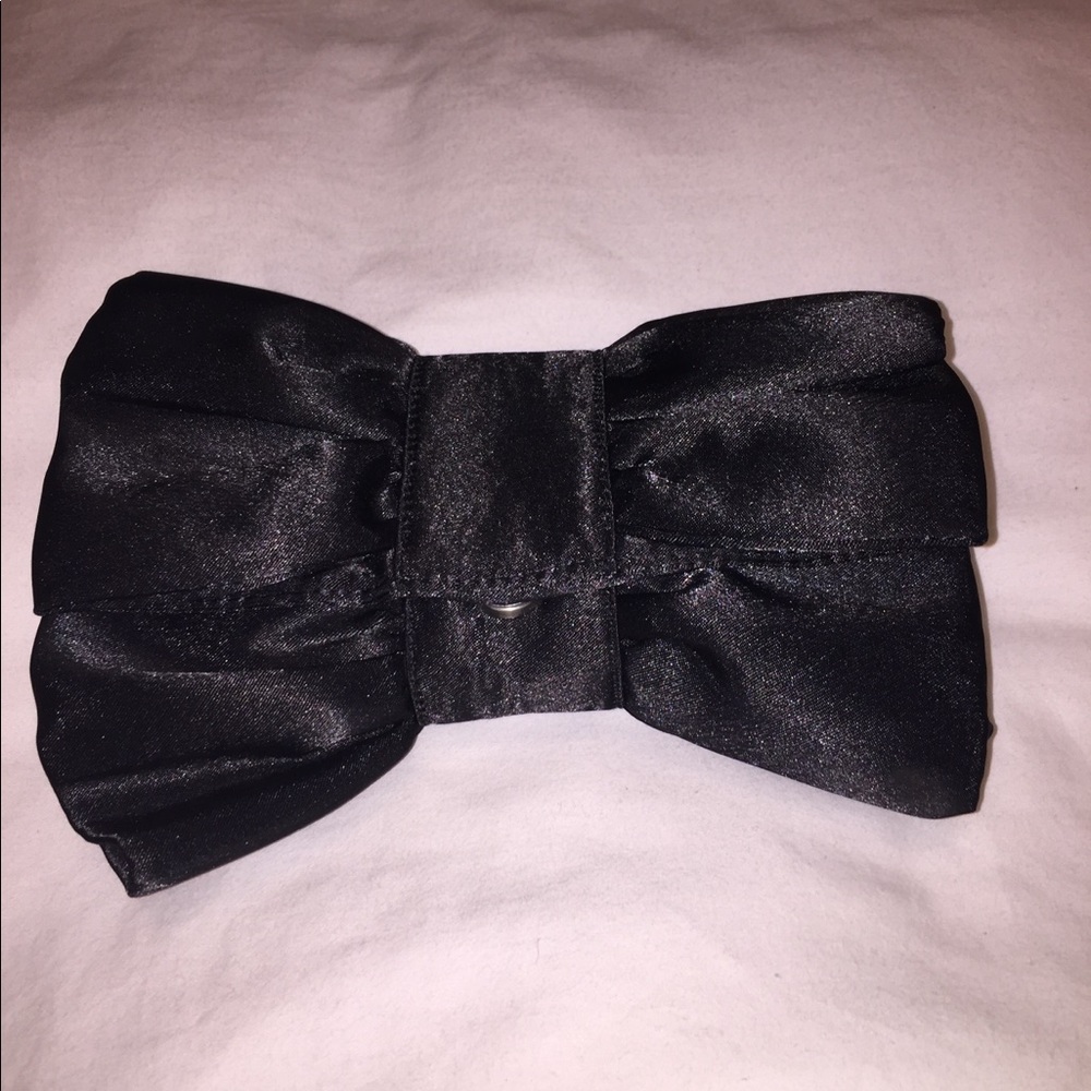 Bow shape black satin clutch.